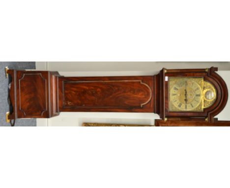 A mahogany eight day longcase clock, arched pediment, stop brass fluted columns, 12-inch arched brass dial, seconds and date 