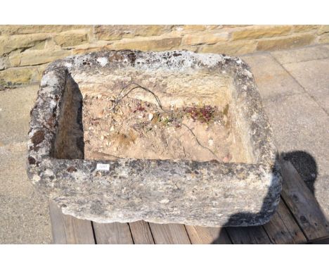 A stone garden trough, 83cm wide 