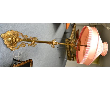 A brass gilded telescopic standard lamp 