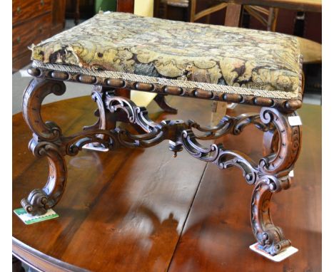 A Victorian carved walnut dressing stool  