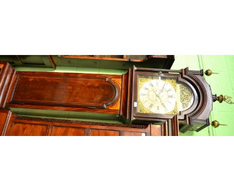 A mahogany eight day longcase clock, caddied pediment with brass finials, inlaid trunk and plinth, bracket feet, 13-inch arch