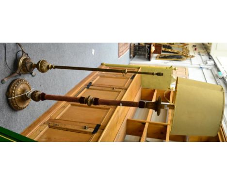 A French giltwood standard lamp and a brass standard lamp