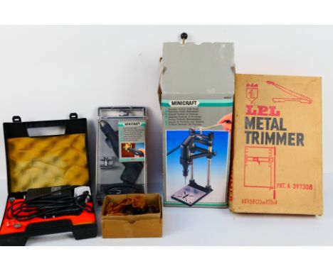 Tools to include a metal trimmer, Minicraft Precision Drill and stand and similar. [W]
