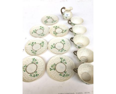 Six Belleek cups and saucers and a jugCondition: some minor age related surface wear, a couple of plates with slight discolou