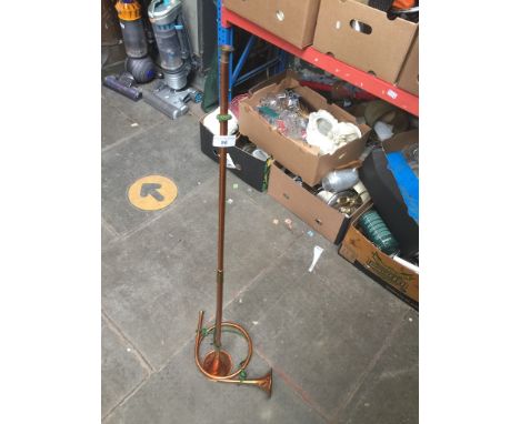A copper hunting horn and a copper bugle 