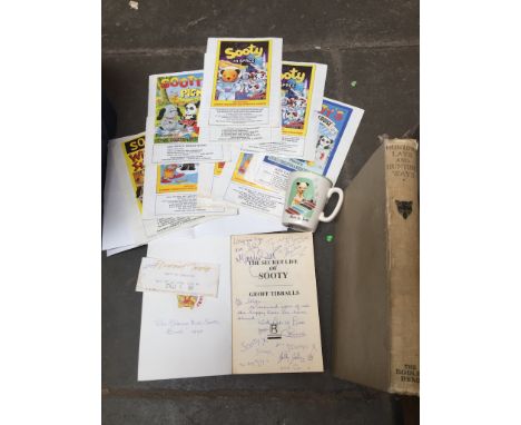 A vintage Sooty ceramic beaker and a signed copy (Matthew Corbett) of 'The Secret Life of Sooty'. 
