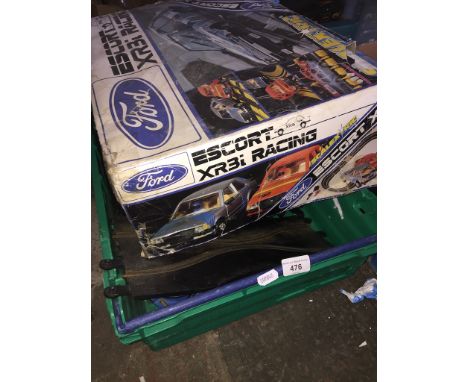 A vintage boxed Scalextric with cars, and a box of track and accessories 