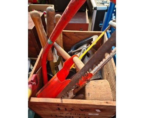 A wooden box containing tools