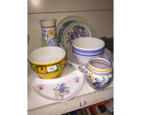 8 pieces of Poole pottery 