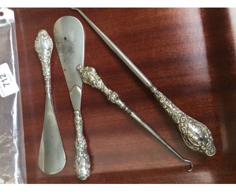 Silver handled button hooks etc. 