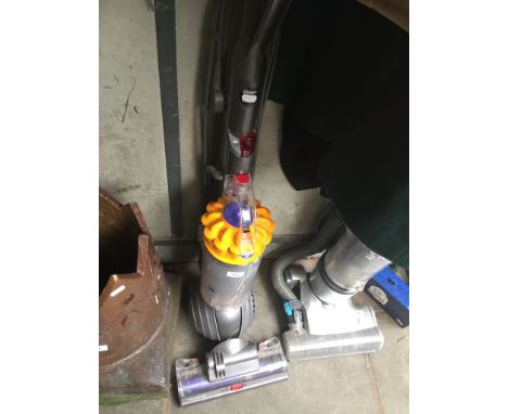 A Dyson DC40 roller ball vacuum cleaner. 