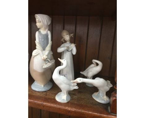 Nao figure, Lladro figure and three Lladro geese 