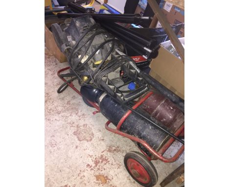 3 boxes and a toolbox of tools, a power washer and welding equipment