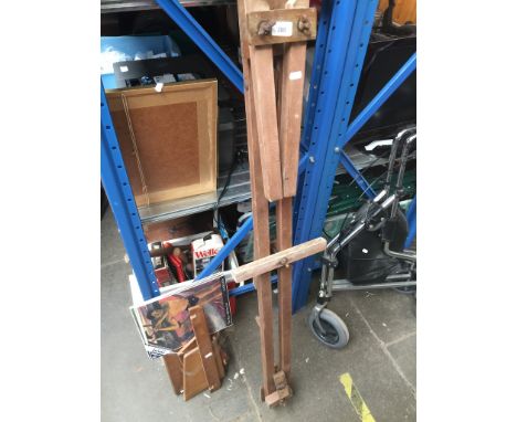 A wooden easel and a book stand 