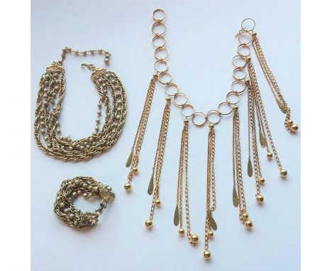 A vintage gilt rope necklace set with beads and a matching bracelet together with a vintage ornate gilt necklace