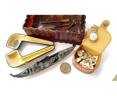 A 1920's Tortoiseshell jewellery box (a/f) containing various items including an 1853 copper penny, pipe case, ladies watch (