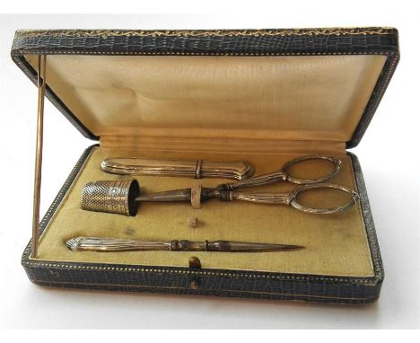 Silver hallmarked boxed complete Needle Set circa 1870, maker GS, consisting of thimble, scissors, needle case, stiletto and 