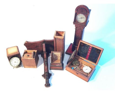 A box containing a late 19th Century / early 20th Century model Grandfather clock together with a movement stamped ANSONIA + 