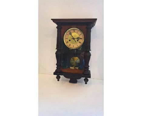 Victorian oak cased wall clock, chiming on the hour / half, missing finial, working with key
