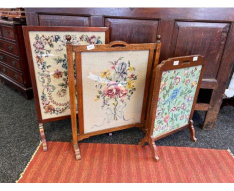 Three Antique fire screens with tapestry glazed fronts.