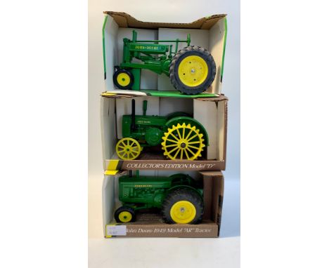 Five Die cast tractors.John Deere 1949 model AR, 1:16 scale.John Deere 1953 model D, 1:16 scale.John Deere 1958 model 630 LP,