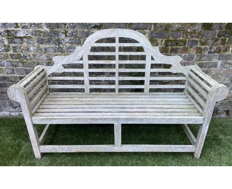 LUTYENS STYLE GARDEN BENCH, weathered teak of slatted construction, 165cm W. 