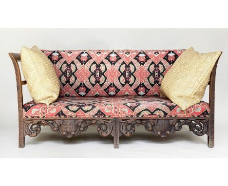 'KELIM' SOFA, late 19th/early 20th century carved oak with kelim style upholstery and pierced frieze, 163cm W. 