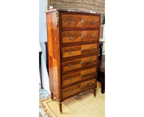 TALL COMMODE, 71cm W x 37cm D x 136cm H, early 20th century French bois satine and brass mounted, the marble top over six dra