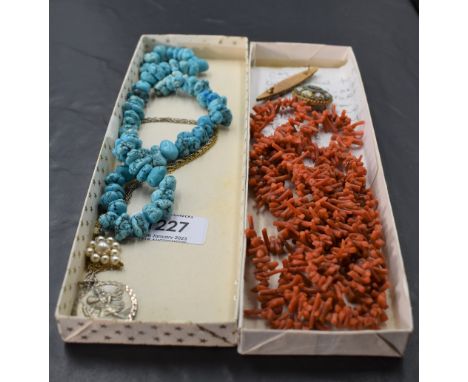 A small selection of jewellery including a long string of branch coral, mosaic brooches, silver St Christopher pendant, simul