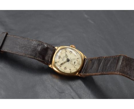 A gent's 9ct gold Rotary Super sports wrist watch having Arabic numeral dial with subsidiary seconds in a gold case on leathe