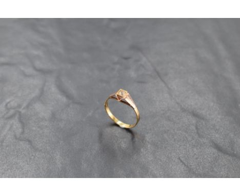 A 14ct gold white stone set ring, the shank marked 585, ring size P, 1.7grams