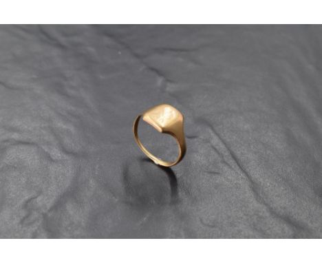 A gents gold signet ring,marks and monogram worn, size Y &amp; approx 6.5g