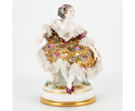 A figurine made of porcelain and marked Volkstedt-Rudolstadt, Germany 19th century. Condition: light damage to the lace dress