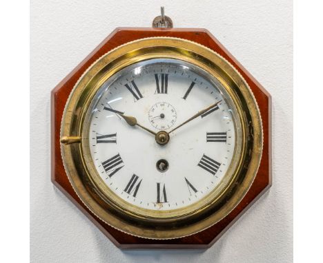 A ship clock mounted on wood, the first half of the 20th century. (9 x 20 cm)