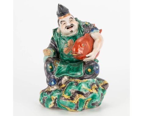 A Chinese porcelain statue of a fisherman. 19th/20th century. (11 x 14 x 20 cm)