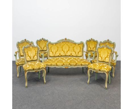 A salon in Louis XV style consisting of a bench, 2 armchairs and 4 chairs patinated in light green and white. The first half 