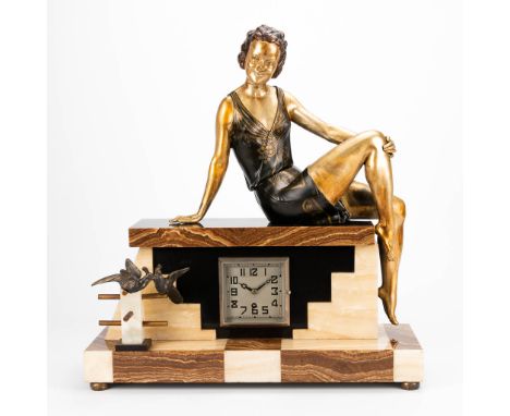 Enrique MOLINS-BALLESTE (1893-1958) A clock made of alabaster and onyx in Art Deco style, with a figurine of a lady and birds