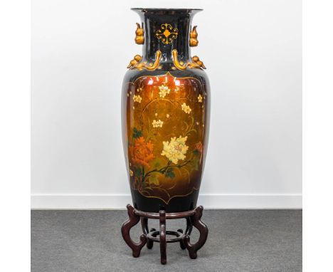 A large Oriental and decorative ceramic vase on wood base. (118 x 37 cm)