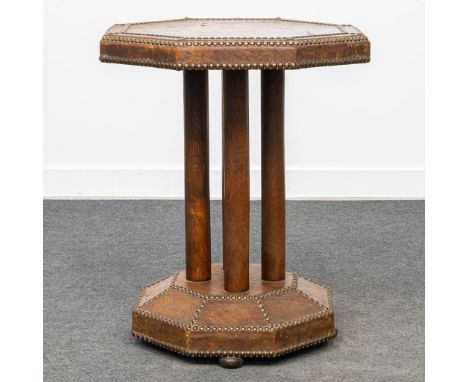 An art deco side table finished with leather and nails. The first half of the 20th century. (50 x 50 x 60 cm)