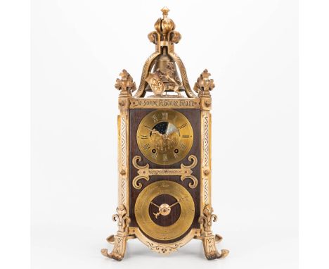 A clock made of metal and marked 'Je sonne la bonne heure'. Neogothic style, 20th century. (22 x 24 x 52 cm)