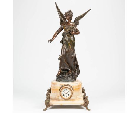 A clock made of alabaster, mounted with spelter angel and fenix. The first half of the 20th century. (30 x 34 x 85 cm)