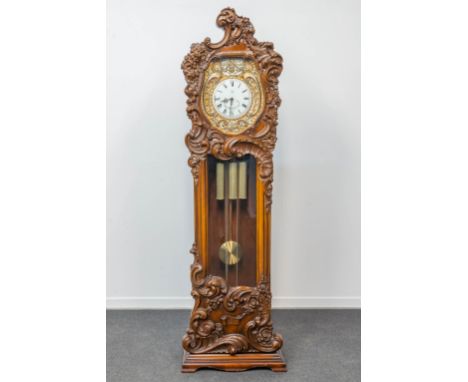 A roccoco standing clock, sculptured wood with westminster movement, the second half of the 20th century. Marked Hertz 1878. 