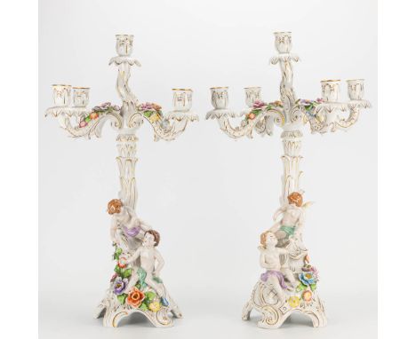 A pair of candelabra made of porcelain in Plau, Germany during the second half of the 20th century. (58 x 34 cm)