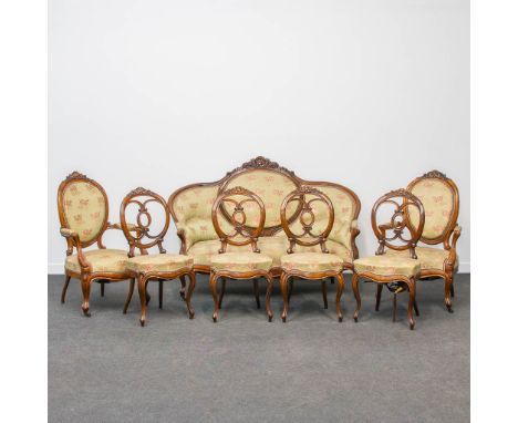 A 7 pieces salon set consisting of 4 chairs, 2 armchairs and a sofa in Louis Philippe style. 19th century. (80 x 163 x 109 cm