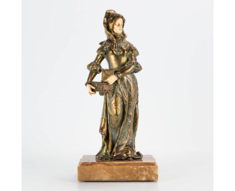 A statue made of spelter and bone, standing on an onyx base. Marked Tremo, made in France. First half of the 20th century. (1