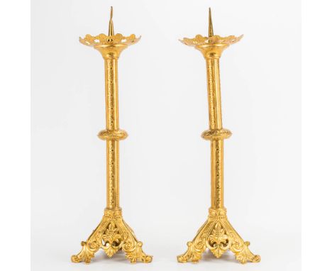A pair of gilt neogothic church candlesticks, the first half of the 20th century. (17 x 19 x 55 cm)