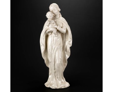 A Madonna with child, made of faience and marked Goebel, Germany. HM 9/III. The second half of the 20th century. (11 x 15 x 3