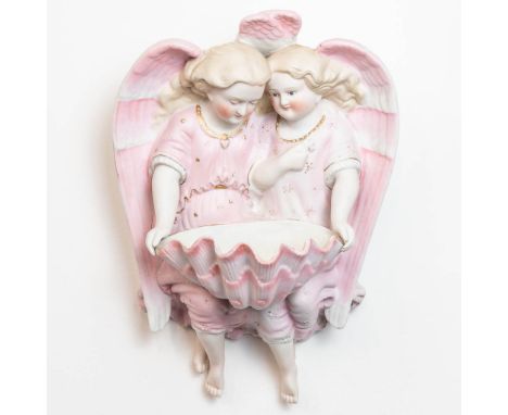 A holy water font made of biscuit with 2 angels. The first half of the 20th century. (13 x 20 x 27 cm)