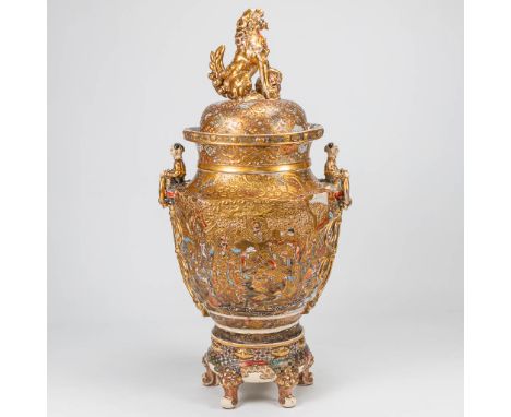 An exceptionally large Satsuma vase with lid on ceramic base, Emperor decor, Japan 19th century. Condition: Multiple restaura
