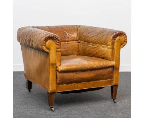 An antique leather club sofa. The first half of the 20th century. Condition: Use marks. (85 x 88 x 70 cm)